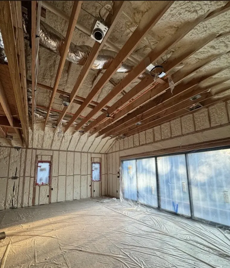 Interior walls and ceiling insulated with spray foam during new construction in Sealy
